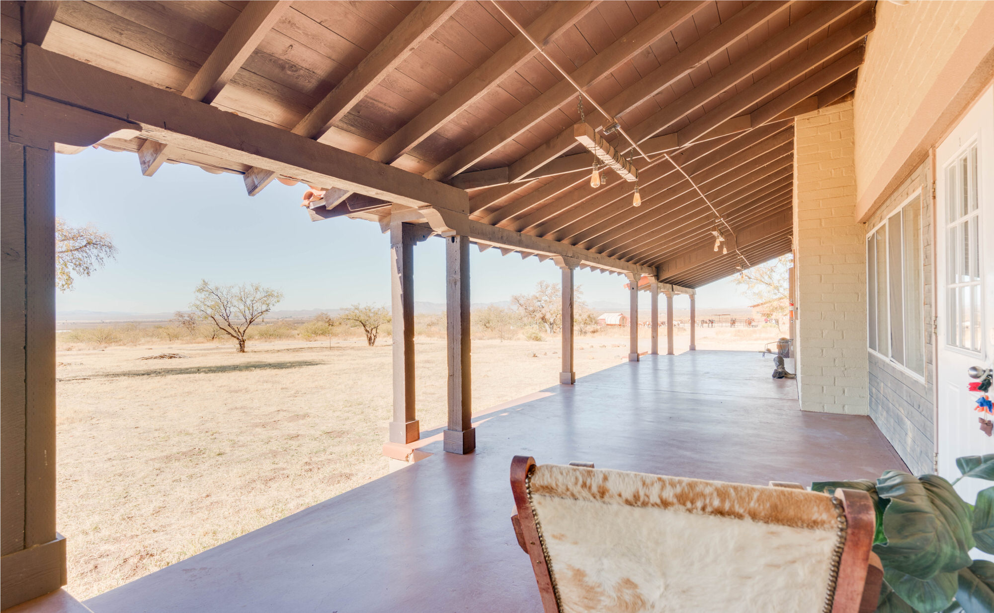 Covered porch overlooking the desert at Seven Arrows.